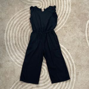 Black ruffled sleeve wide leg jumpsuit